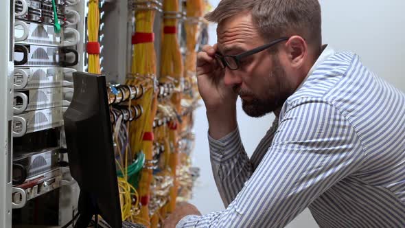 Engineer Working in Data Room