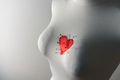 Dummy with pinned red paper heart - PhotoDune Item for Sale