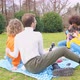 Four multiethnic friends outdoor using smartphone - VideoHive Item for Sale
