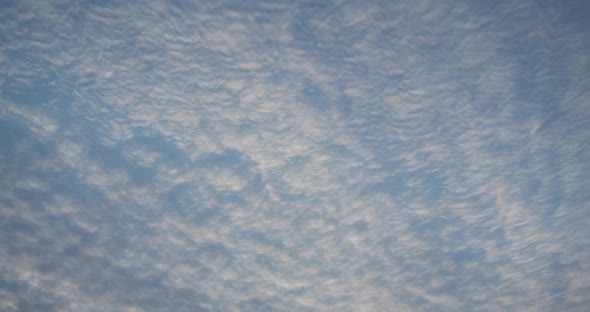 White Clouds Move Quickly Across The Sky