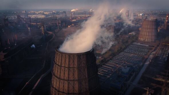 view on pipes with smoke. smoke from the chimney. heavy industry with air pollution produced