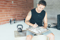 Personal_trainer_preparing_routine - PhotoDune Item for Sale