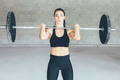 Fitness_young_woman_with_barbell - PhotoDune Item for Sale