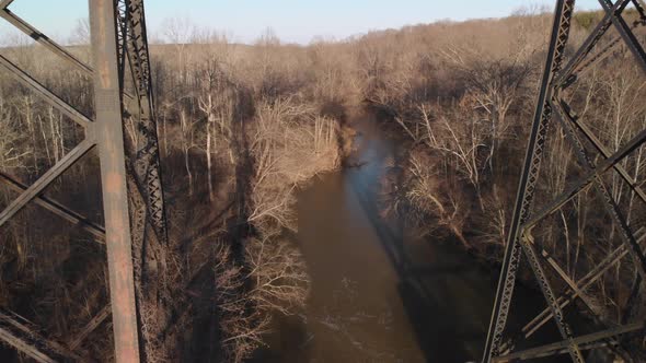 Reversing from the muddy Appomattox River to reveal High Bridge Trail, a reconstructed Civil War rai