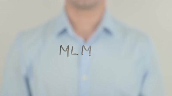 MLM, Man Writing on Transparent Glass Screen