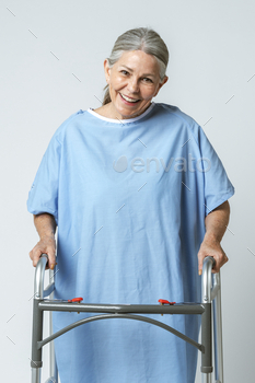 Happy patient using a zimmer frame