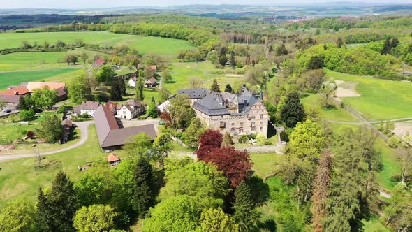 Eisenbach Castle in lush landscape, Hesse, Germany