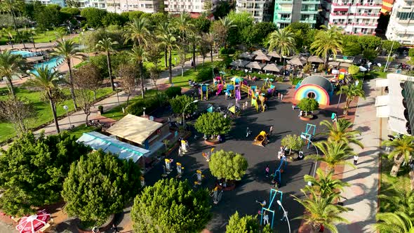 Children Play on the big playground Aerial View 4 K