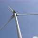 Wind turbine in operation on a sunny blue sky. 4K video - VideoHive Item for Sale