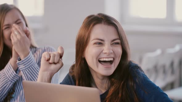 Young Happy Casual European Female Office Manager Laughing, Smiling While Discussing Work at