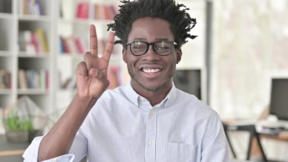 Victory Sign By African Man