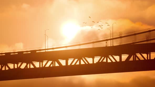 Sun Rises Behind The Bay Bridge