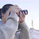 Close up of Asian woman standing and taking a picture at park - VideoHive Item for Sale