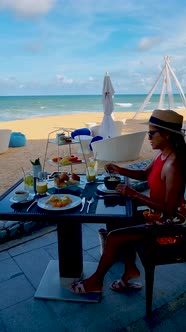 Breakfast on the Beach in Thailand a Luxury Breakfast Table with Food and Beautiful Tropical Sea