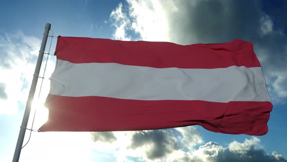 Austria Flag Waving in the Wind Against Deep Blue Sky