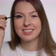 Young Beautiful Woman Doing Makeup - VideoHive Item for Sale