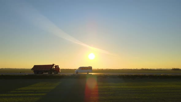 Aerial View of Cargo Truck Driving on Highway Hauling Goods