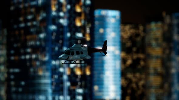 Slow Motion Helicopter Near Skyscrapers at Night