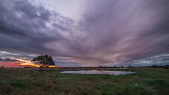 Time Lapse in Namibia - Watering Hole cloudsing past