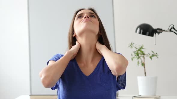 Beautiful Woman Tired while Working in Office