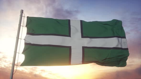 Devon flag, England, waving in the wind, sky and sun background