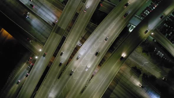 Aerial View From Above Over the Large Multi-level Intersection of Los Angeles Freeway at Night.