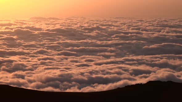 Twilight Before Sunrise Over the Clouds Landscape From Mountain Peak