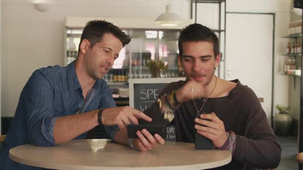 Caucasian men spending time together in a coffee