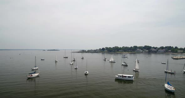 Boats Docked and Ferry Passing on Echo Bay on a Cloudy Day