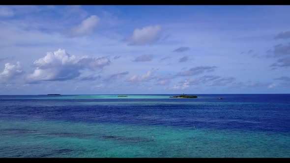 Aerial view panorama of beautiful shore beach vacation by blue sea with white sandy background of a 