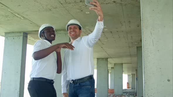 Team of Builders Happy Smiling Take Selfie Photo During Meeting on Construction Site