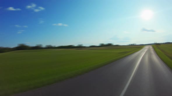 By car on a rural road, time-lapse