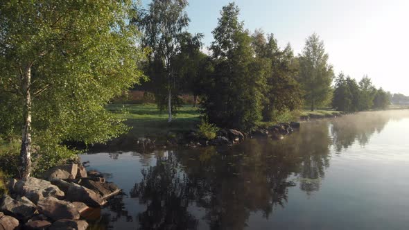 Beautiful misty shore line on a calm morning.