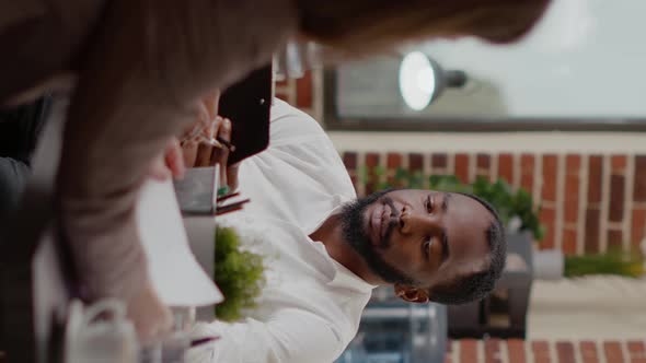 Vertical Video Close Up of African American Man Working on Business Project