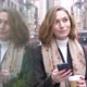 Blond woman using smartphone with coffee to go in London - VideoHive Item for Sale