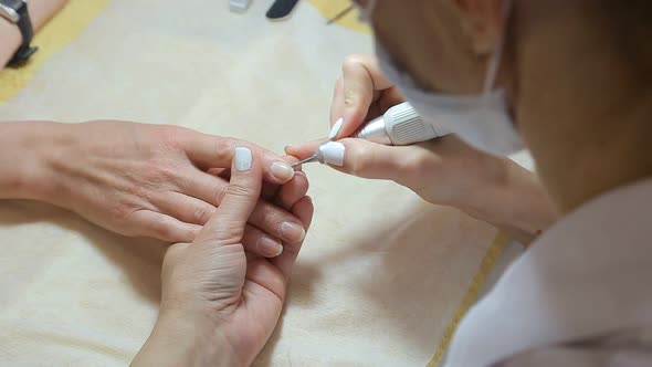 The Process of Professional manicure.Spa Treatments, Beauty Center