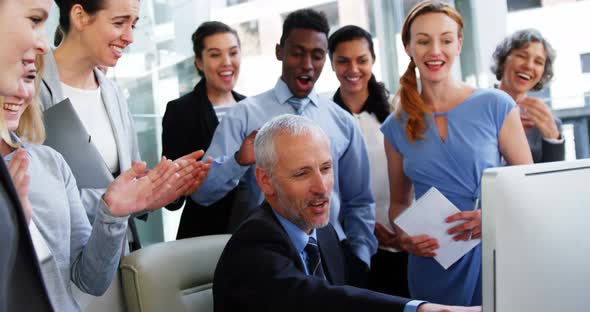 Group of Business people appreciating their colleagues works