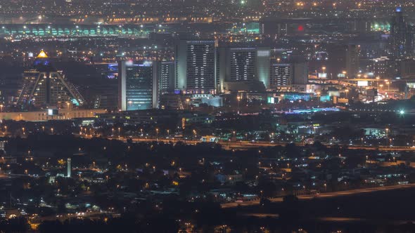 Aerial View of Neighbourhood Deira and Dubai Creek with Typical Old and Modern Buildings Night