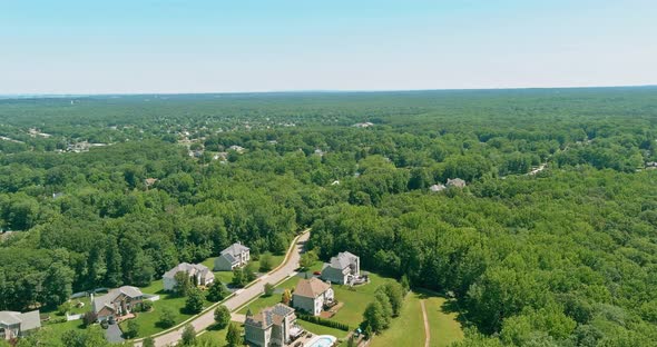 Aerial Roofs of the Houses in the Between the Forest Landscape of a Small Sleeping Area Monroe Town