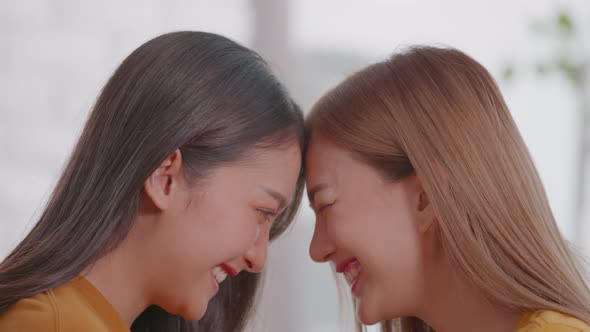 Young Asian women couple is teasing each other. They are the cutest LGBT couple