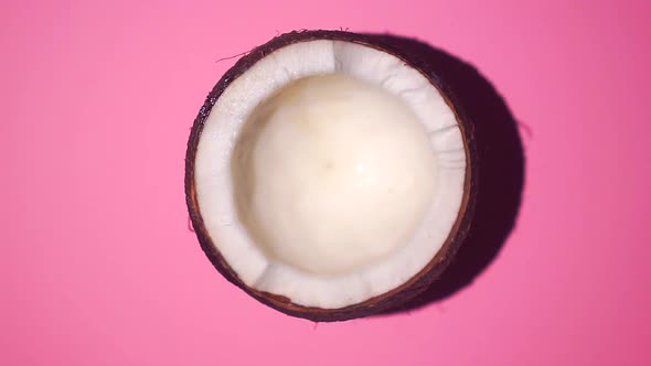 Coconut Rotates on a Blue Background