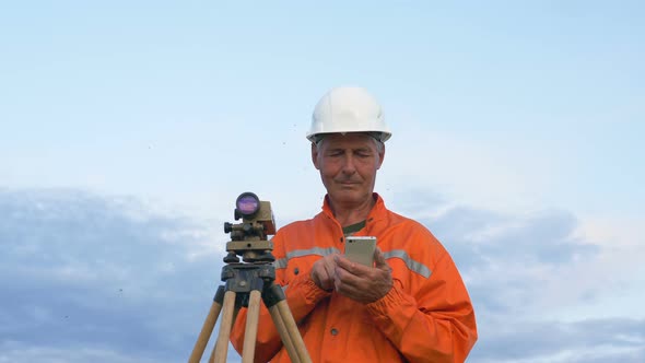 Explorer in Orange Types on Smartphone By Geodetic Device
