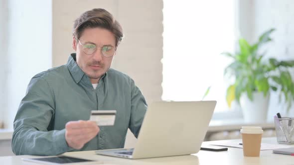 Online Payment Failure on Laptop By Middle Aged Man