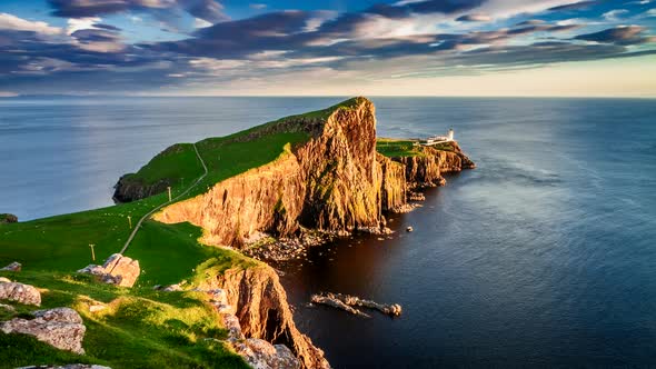 Beautiful sunset at Neist point lighthouse, Scotland, United Kingdom, 4k, timelapse