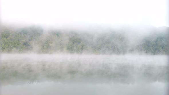 Morning fog over the river. Beautiful landscape.