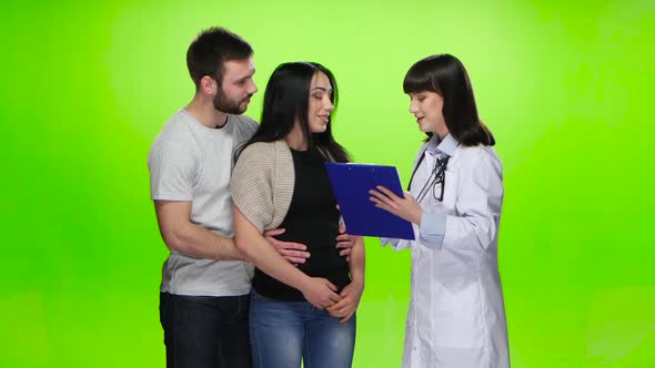 Young Couple Enjoys From the Words Heard From the Doctor