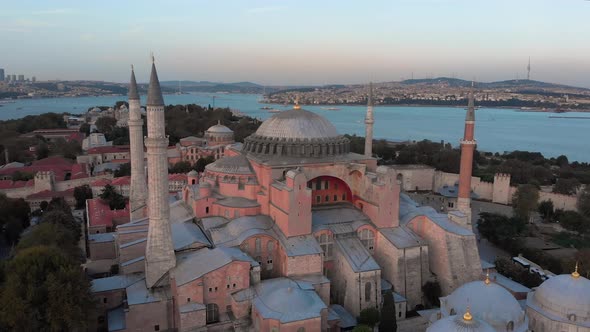 Hagia Sophia Holy Grand Mosque (Ayasofya Camii) with Bosphorus and city skyline on the background