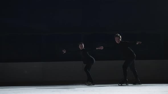 Pair Figure Skating on the Rink