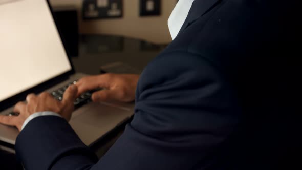Businessman working on laptop 
