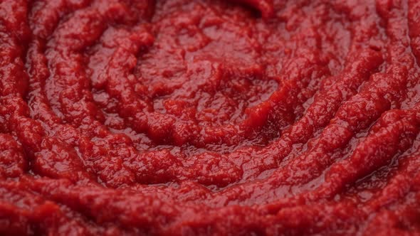 Tomato sauce or ketchup. Fresh tomato pasta sauce top view rotation